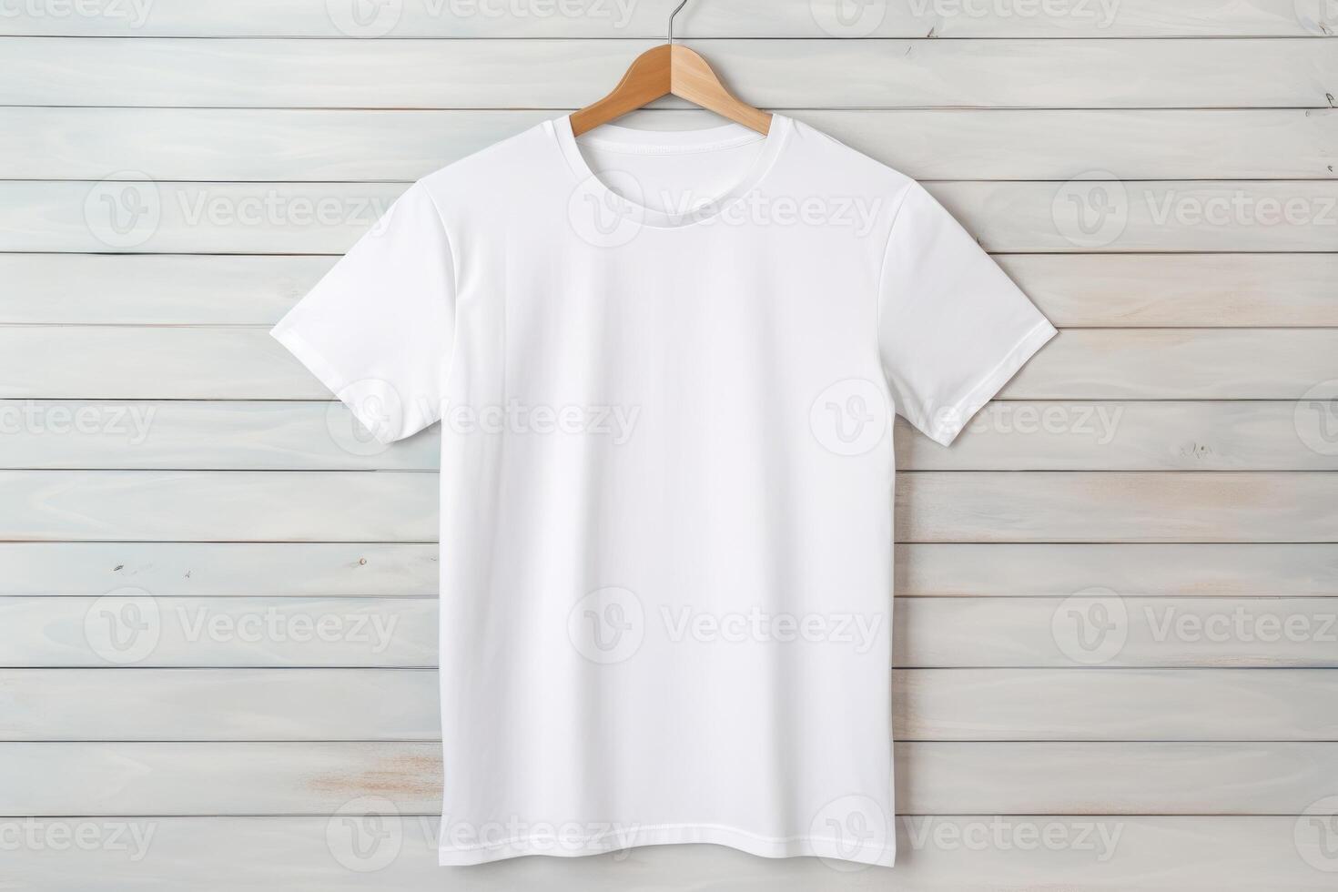 White tshirt mockup on hanger on wooden background, photo