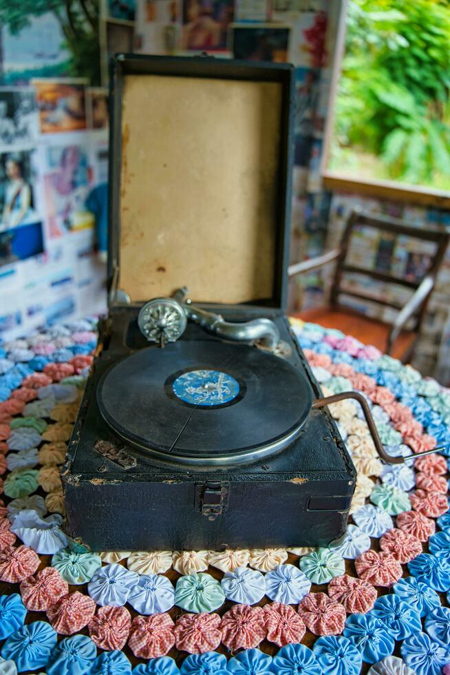 Mahe Seychelles 02.07.2023 Vintage and Antique Record Player inside the made house, Rosa, dated back in 1870s located in the craft village, Mahe Seychelles photo