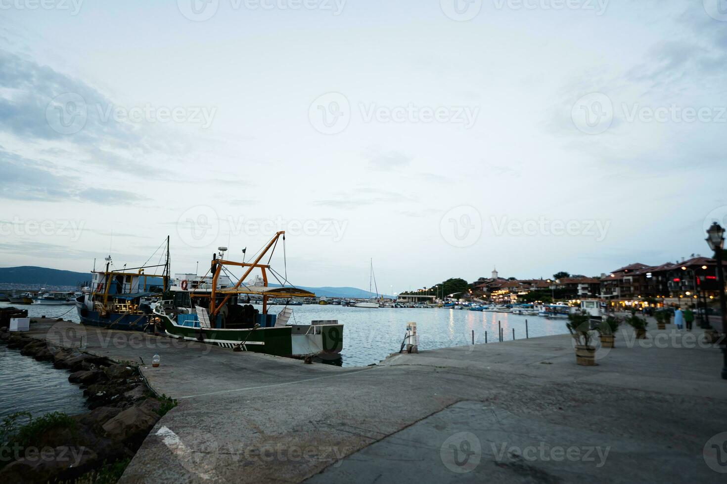 Fishing boats moored in the port of Nessebar, Bulgaria photo