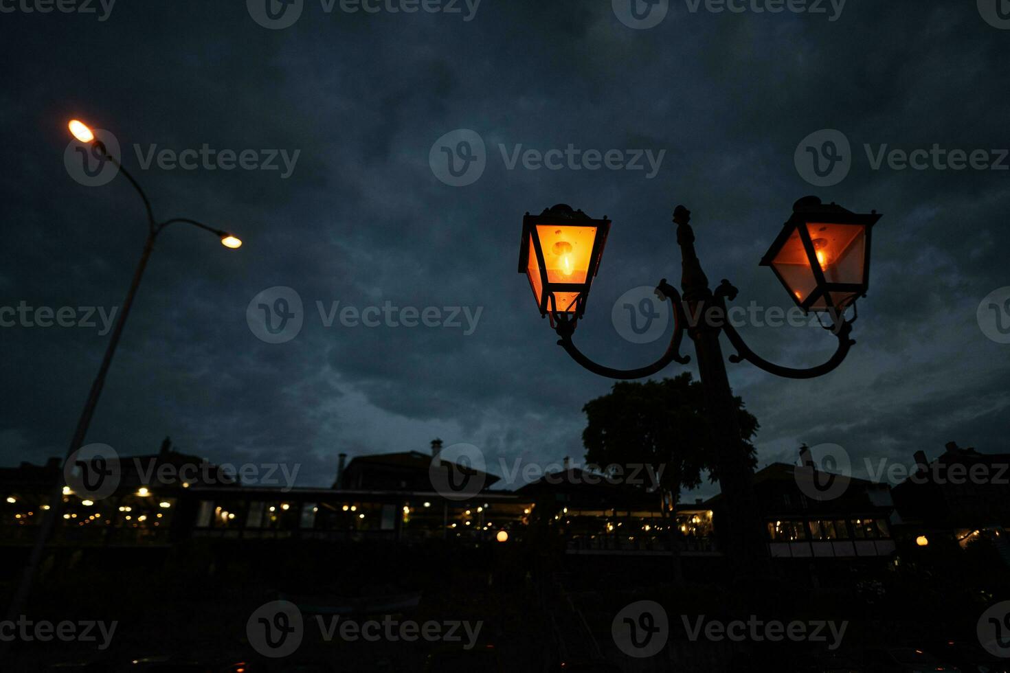 Lanterns on the street in the city at night Nessebar, Bulgaria. photo