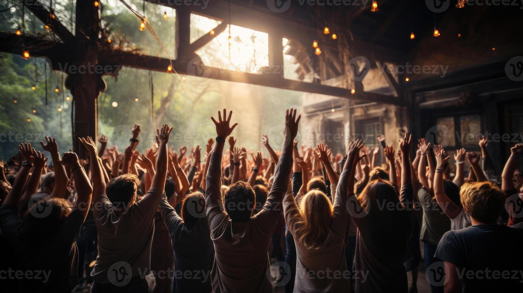 Group of people dancing at a music festival. Audience enjoying the party. . photo