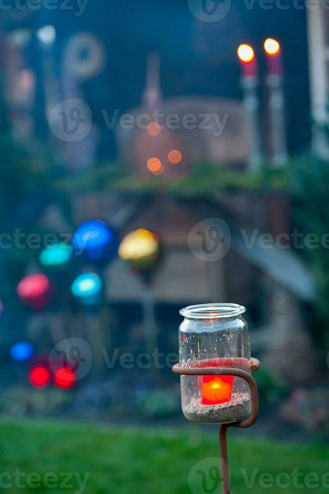 CANDLES IN THE GARDEN photo