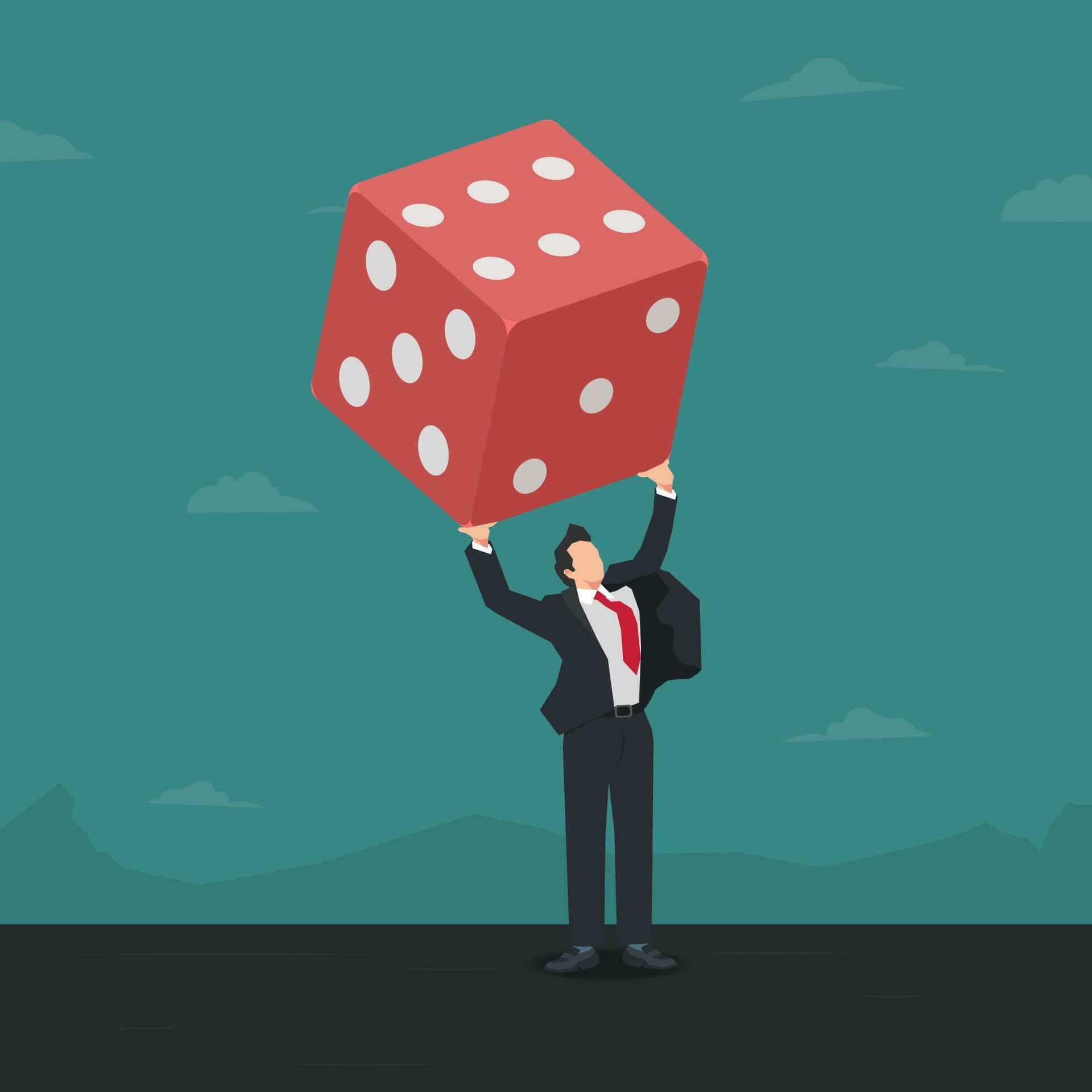 Businessman lifting the red dice. Risk and speculative business concept