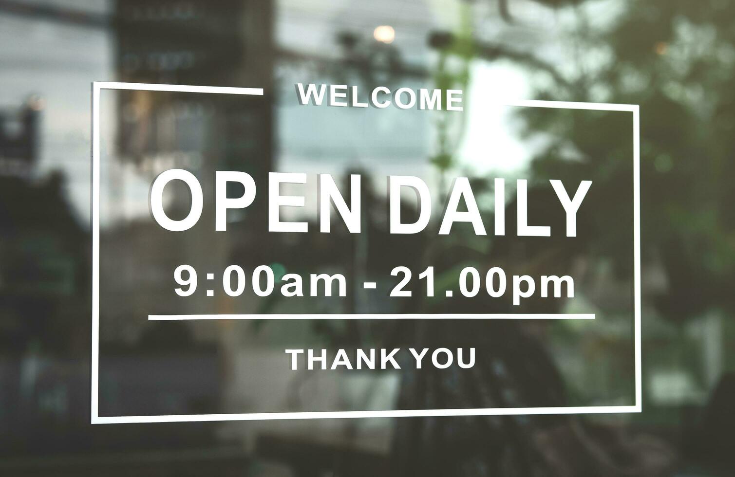 A sign informing customers of cafes on holidays. Open sign on the glass door of the restaurant. service business idea open every day photo