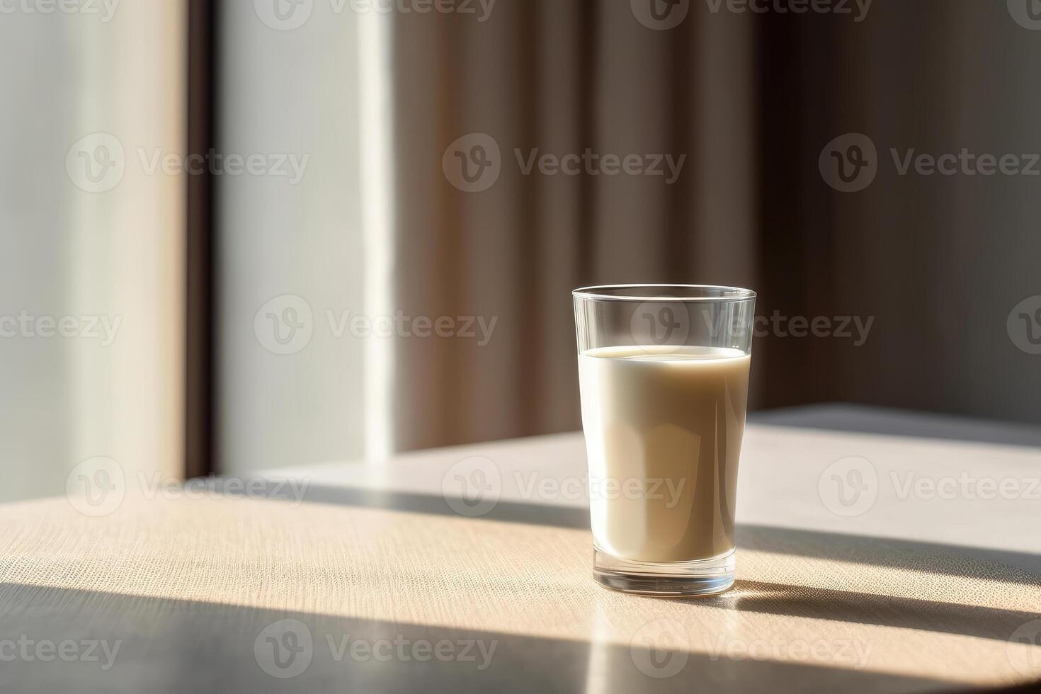 A glass of milk on the table. technology. photo