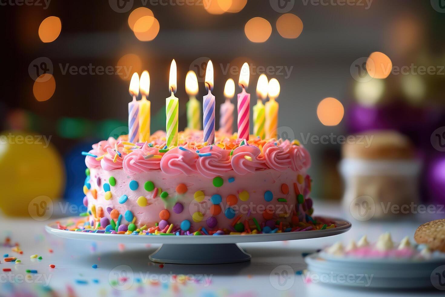 Festive multi colored cake with candles. technology. photo