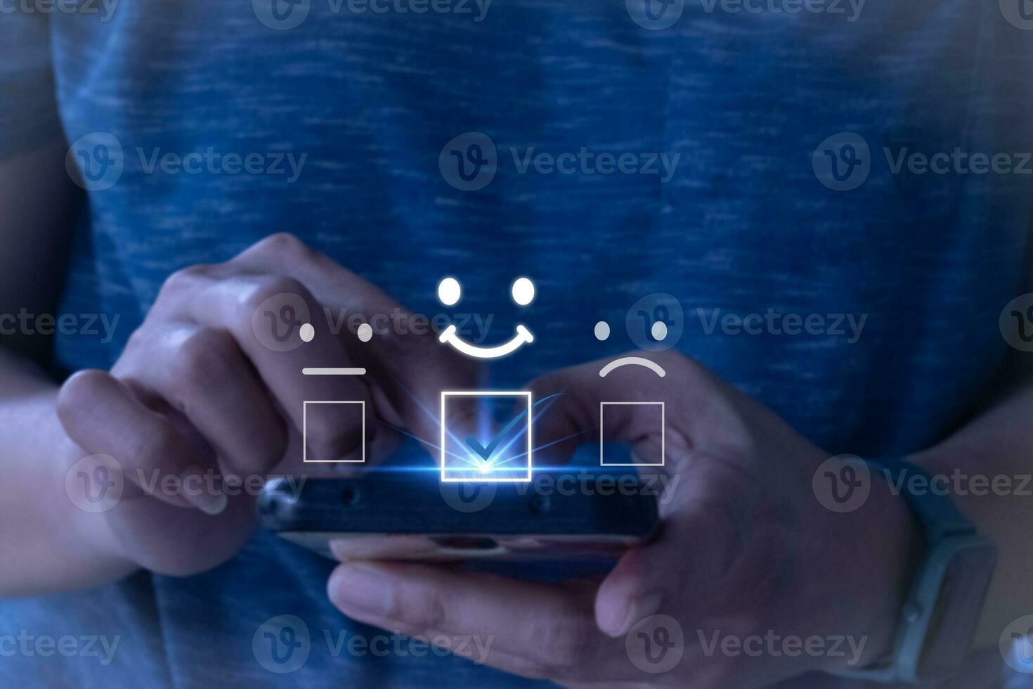 Customer service and Satisfaction concept, Business people touching the virtual screen on the happy Smile face icon to give satisfaction in service. rating very impressed. photo