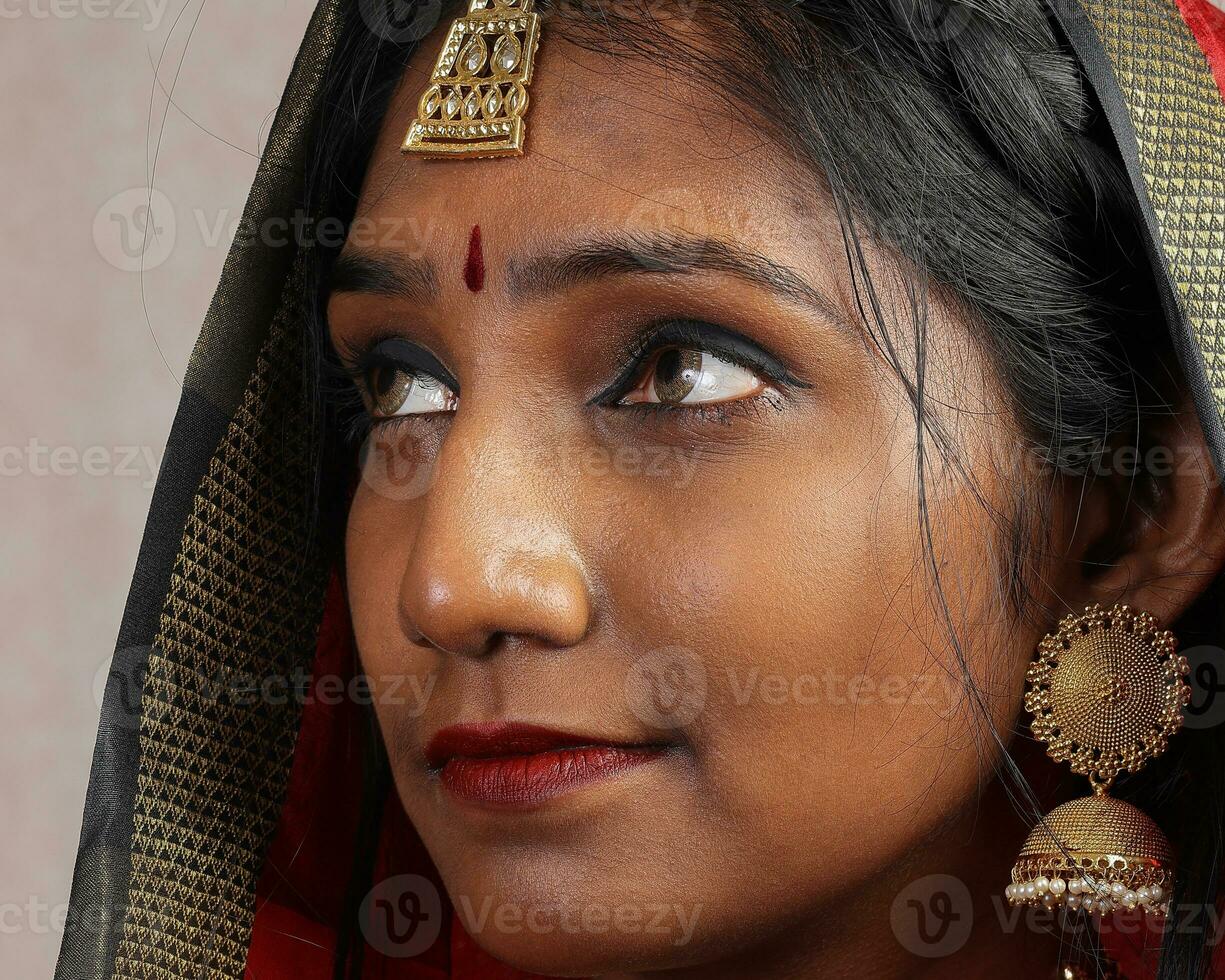 Beautiful young Indian lady posing expression photo