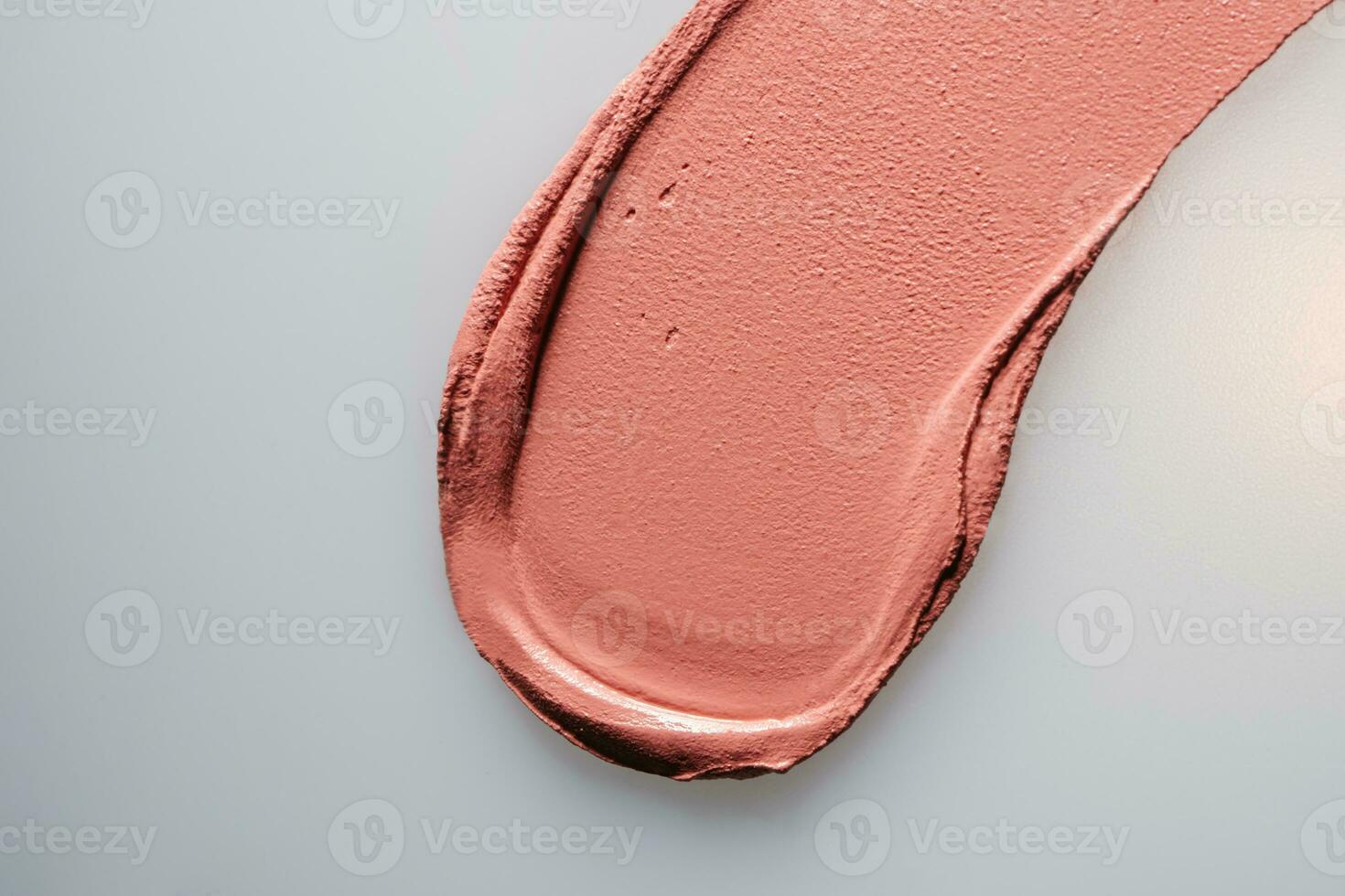 The texture of cream blush on a white background. photo