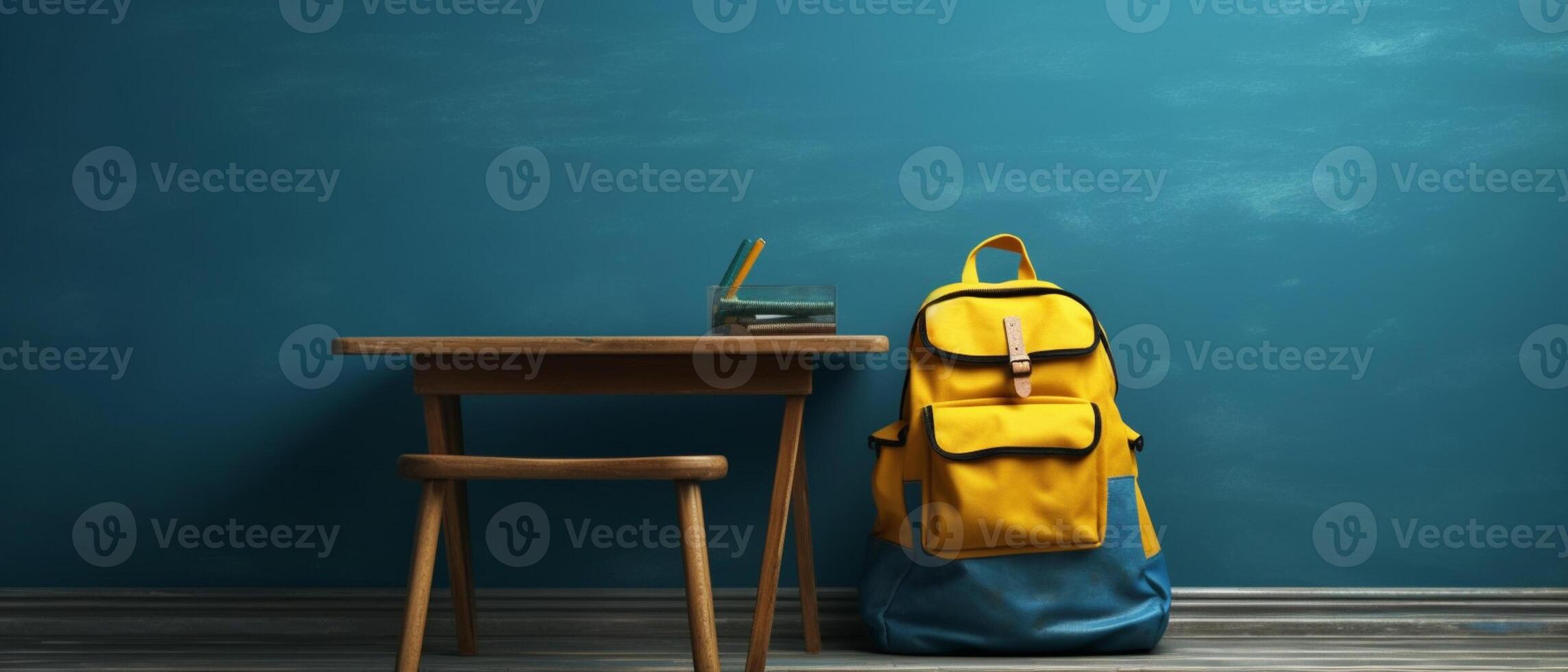Table with chair and school bag in bright style with photo