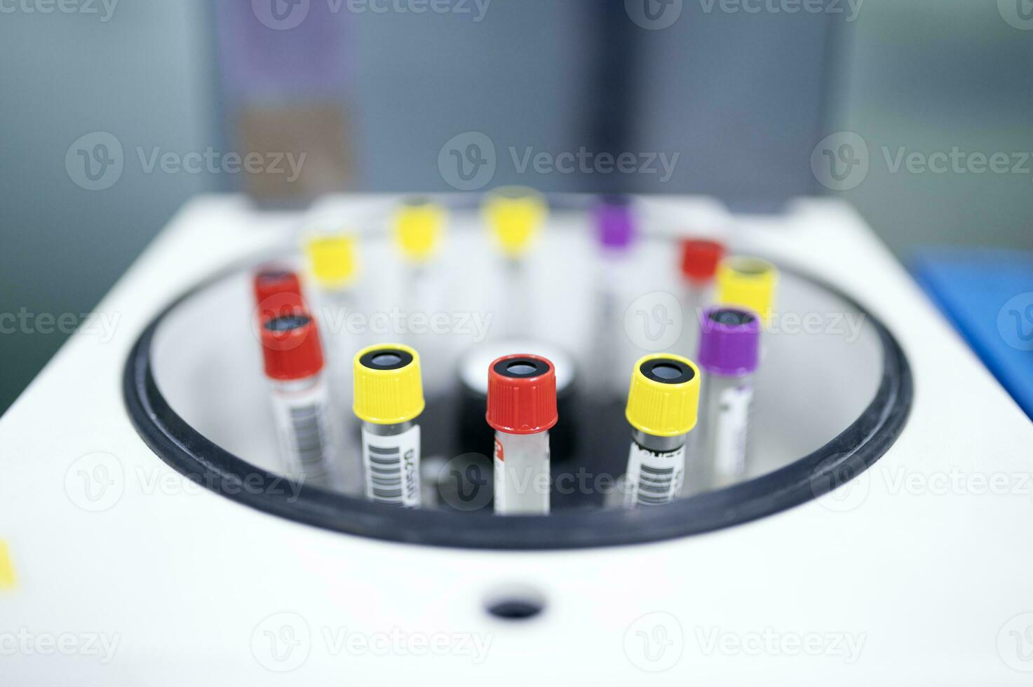Container for tubes of biochemical analyzers Doctor removes from lab centrifuge Zika virus ZIKV photo