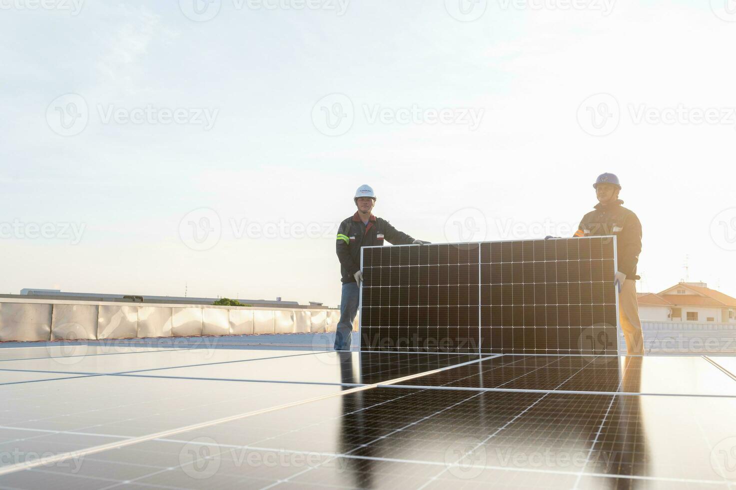 2 engineers install solar and maintain solar power plant , Engineer team to inspect and maintain solar power plants solar power plant photo