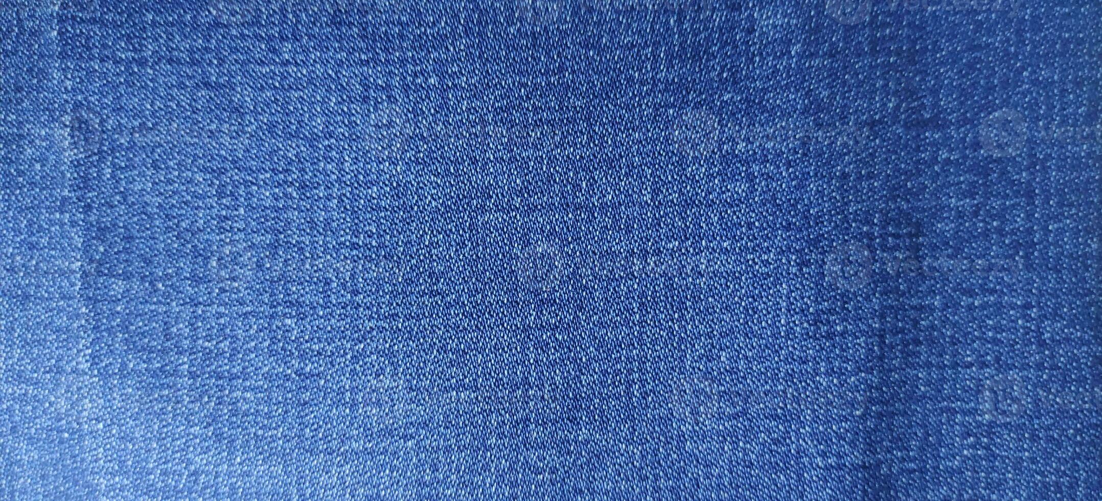 denim jeans fabric, light blue denim fabric close up photography, denim jeans cloth, denim texture, indigo photo