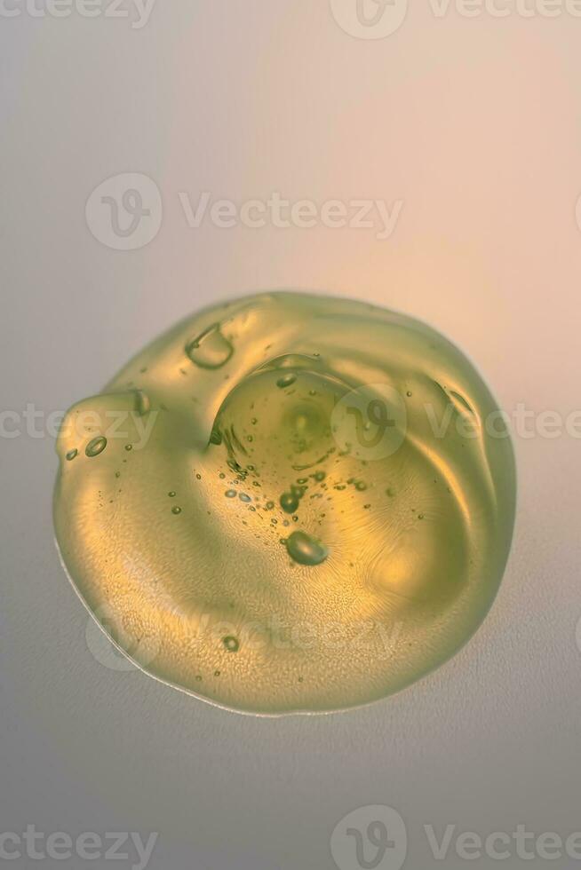 Green gel texture of a cosmetic care product. photo