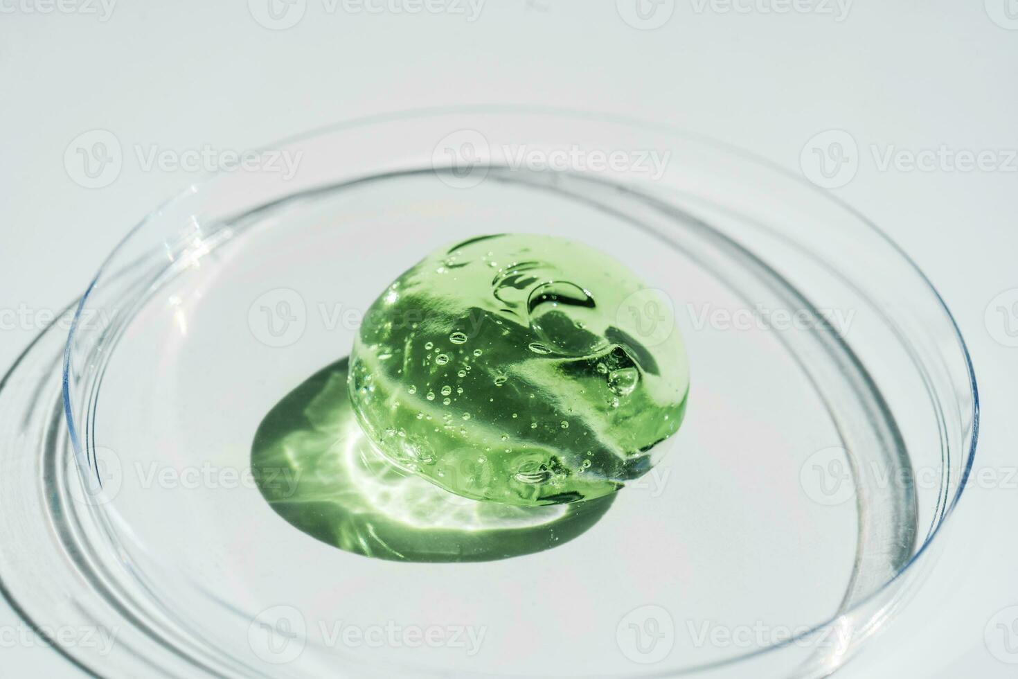 Green gel texture of a cosmetic care product. photo