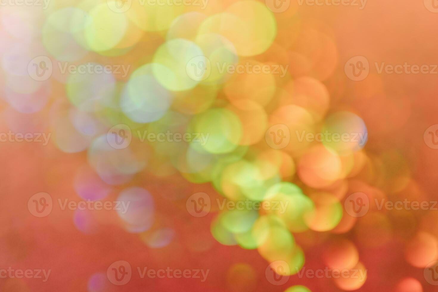 Abstract sequin background with shining festive bokeh. photo
