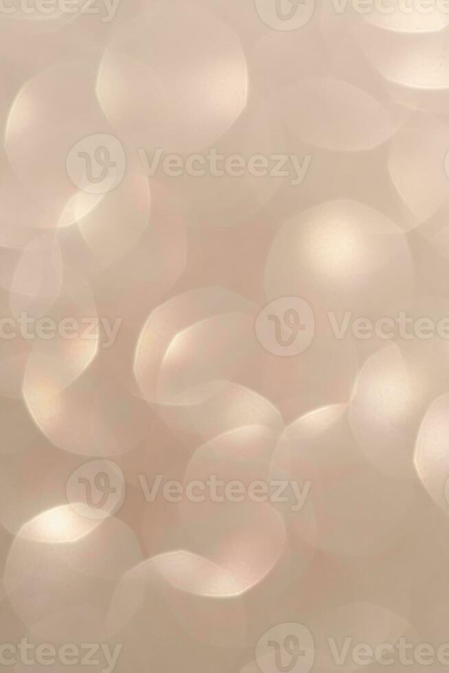 Gold abstract glitter background with shiny bokeh photo