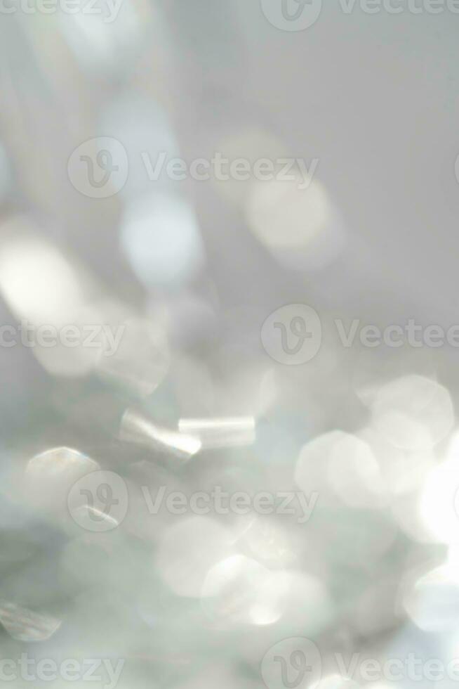 Abstract atmospheric background of tinsel with bokeh. photo