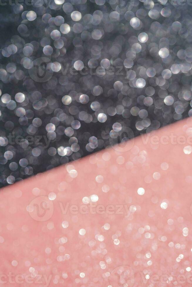 Black and pink abstract glitter background with shiny bokeh photo