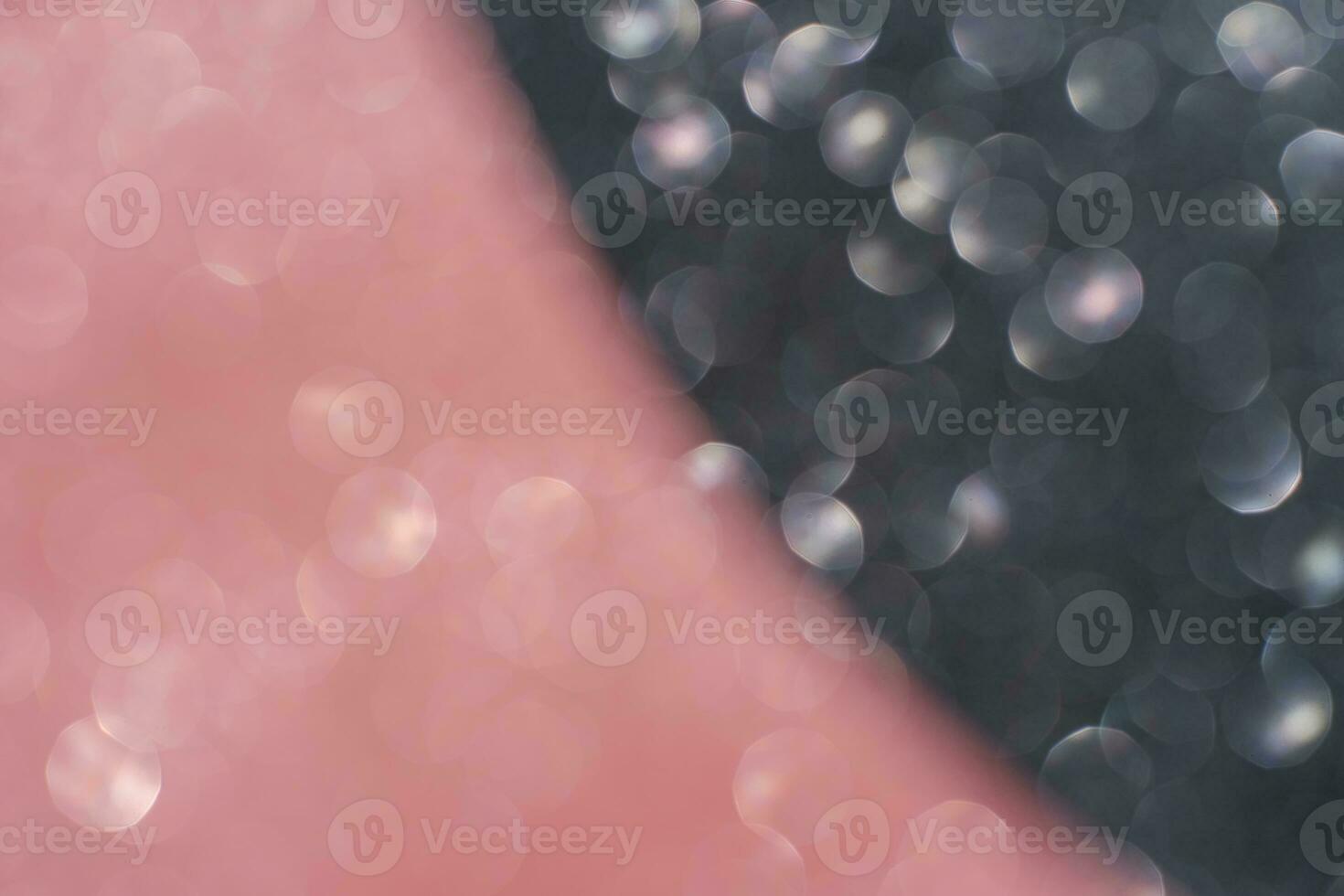 Black and pink abstract glitter background with shiny bokeh photo