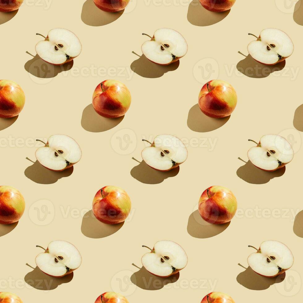 Pattern of apples on a beige background. photo