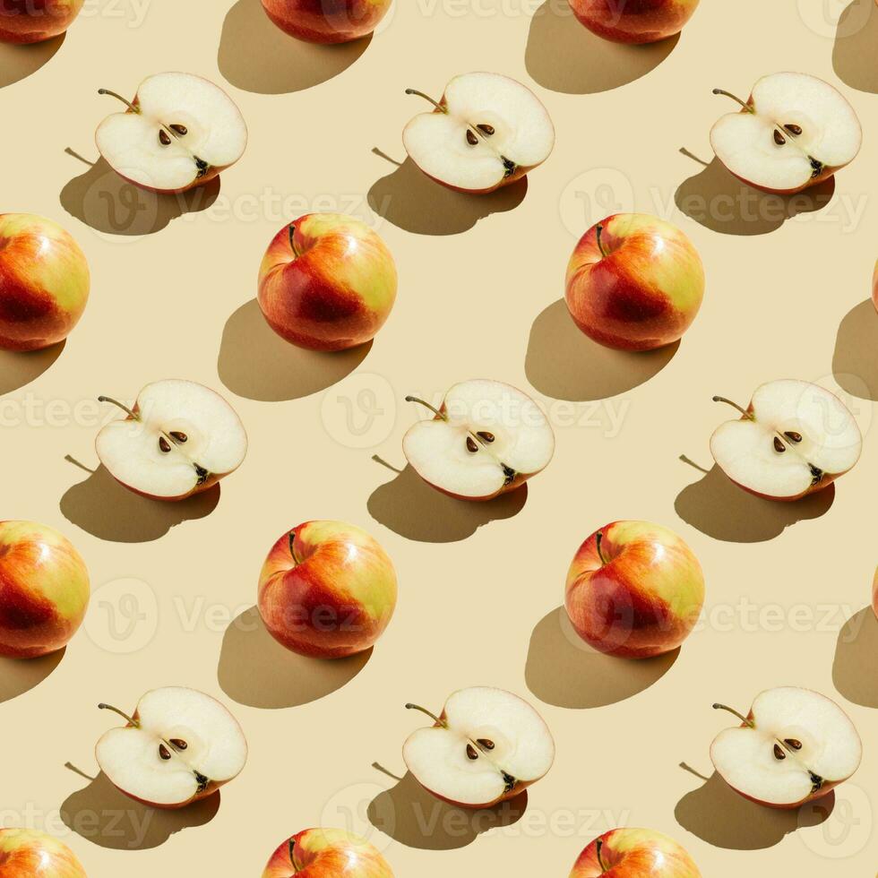 Pattern of apples on a beige background. photo