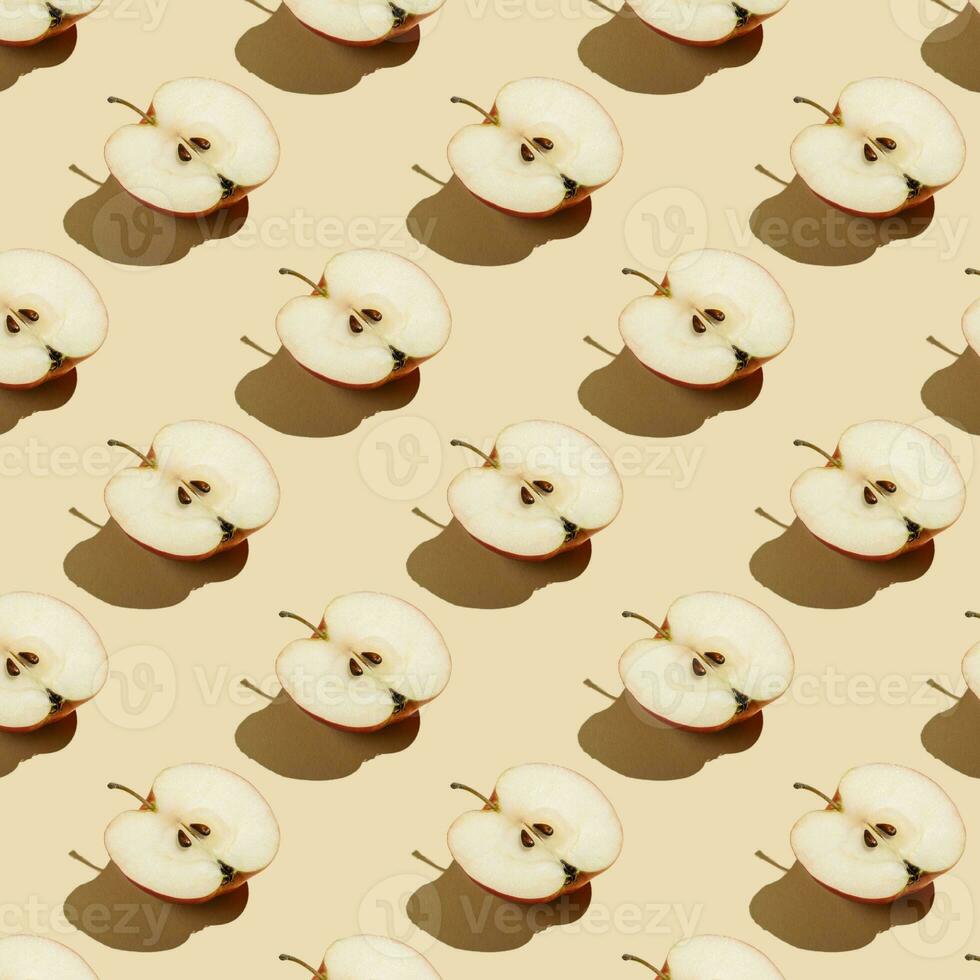 Pattern of apples on a beige background. photo