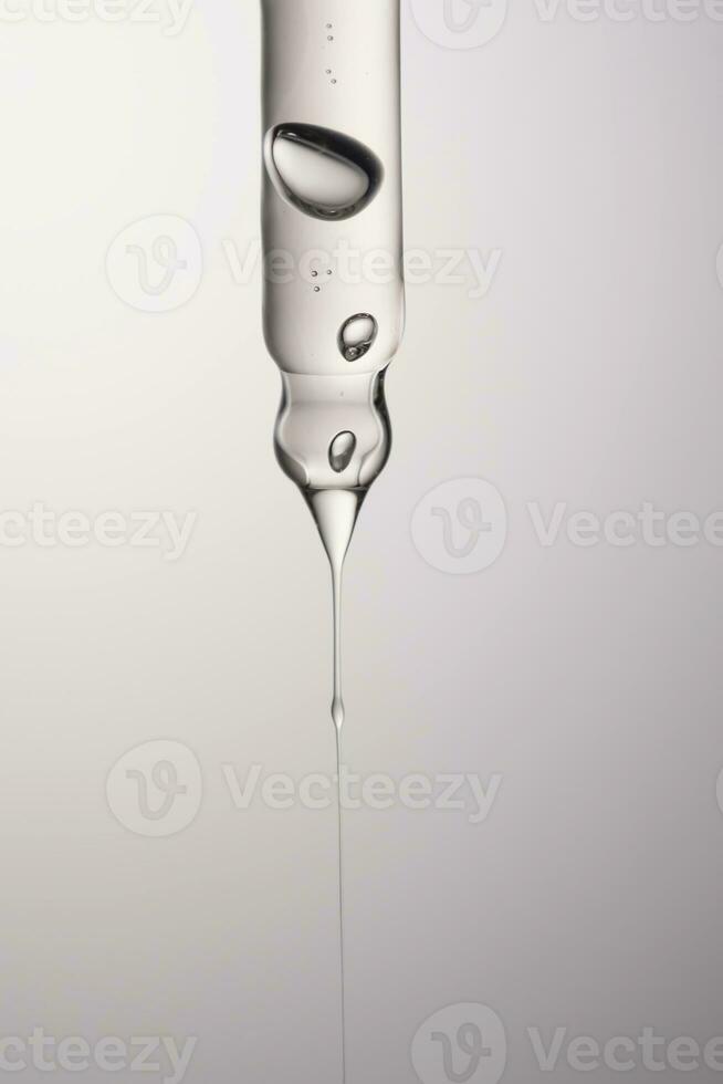 Pipette with serum, gel, oil or other cosmetic product. photo