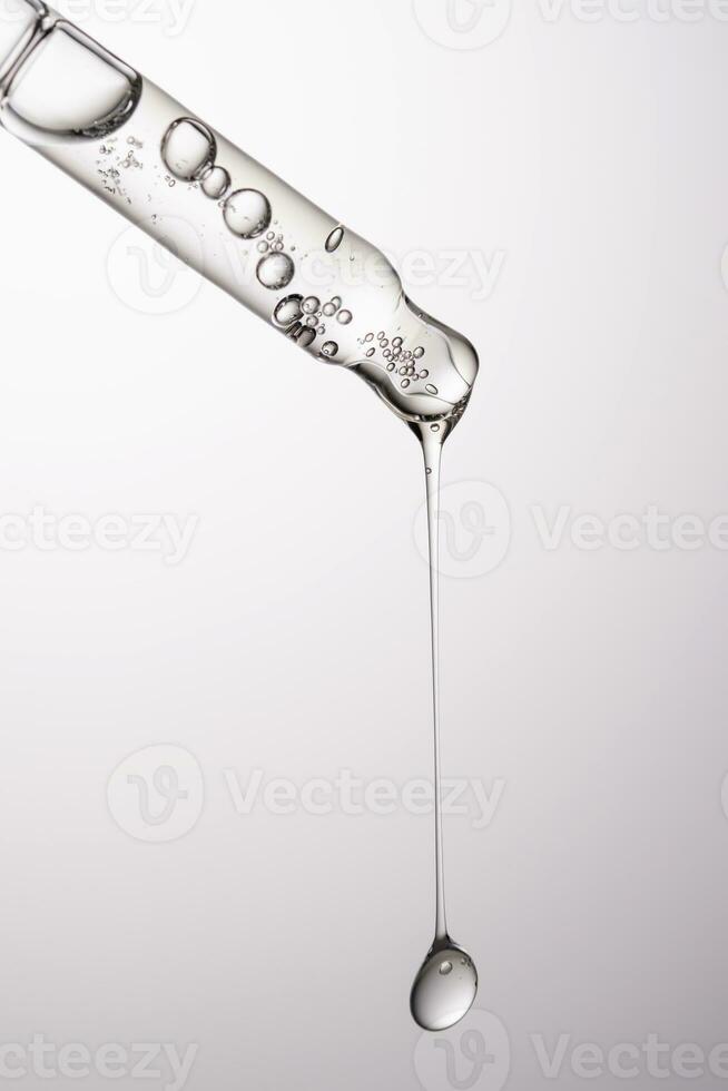 Pipette with serum, gel, oil or other cosmetic product. photo