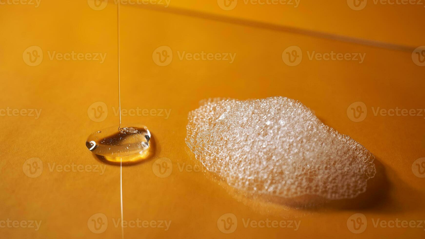 A drop of gel and the texture of the foam. It can be the texture of shampoo, shower gel or dishwashing detergent. photo