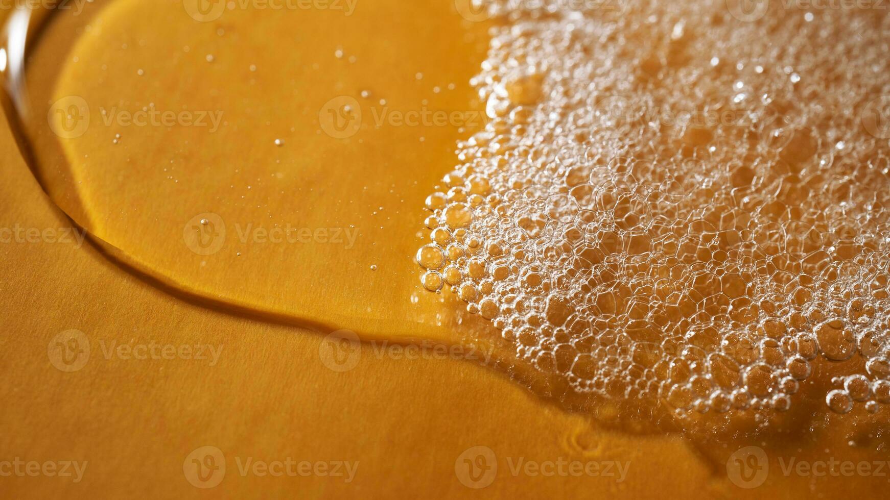 A drop of gel and the texture of the foam. It can be the texture of shampoo, shower gel or dishwashing detergent. photo