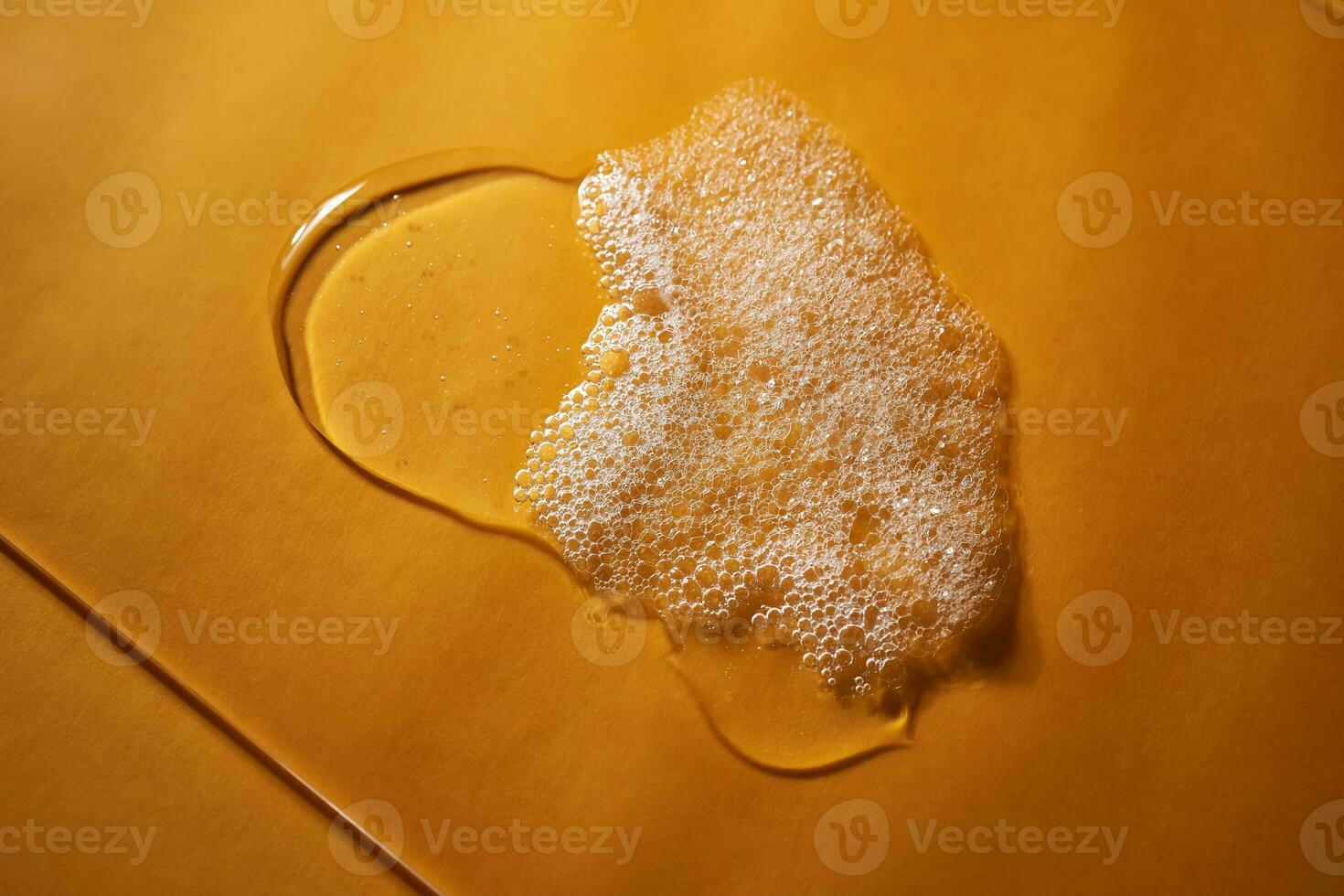 A drop of gel and the texture of the foam. It can be the texture of shampoo, shower gel or dishwashing detergent. photo