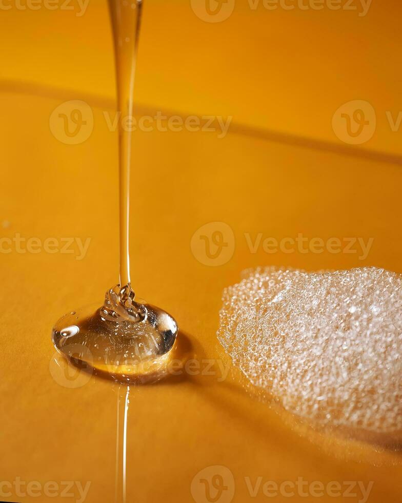 A drop of gel and the texture of the foam. It can be the texture of shampoo, shower gel or dishwashing detergent. photo