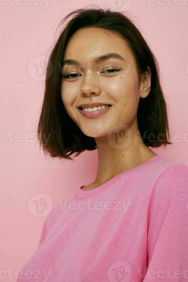 beautiful girl summer style pink t shirt studio isolated background photo