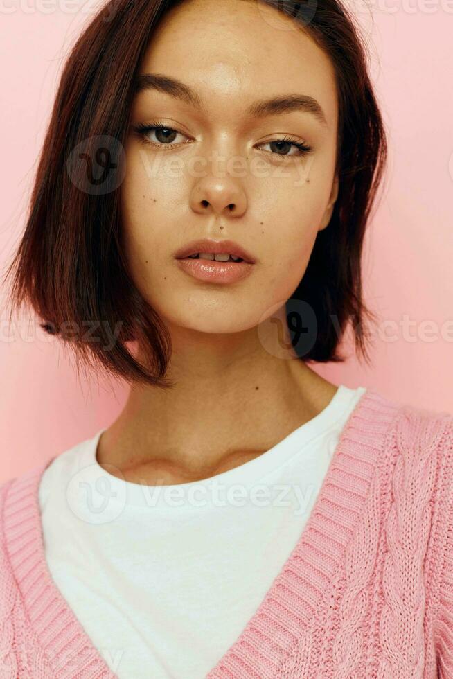 photo pretty girl emotions close-up posing pink background