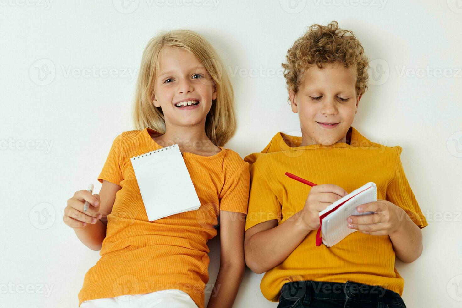 picture of positive boy and girl childhood entertainment drawing childhood lifestyle unaltered photo