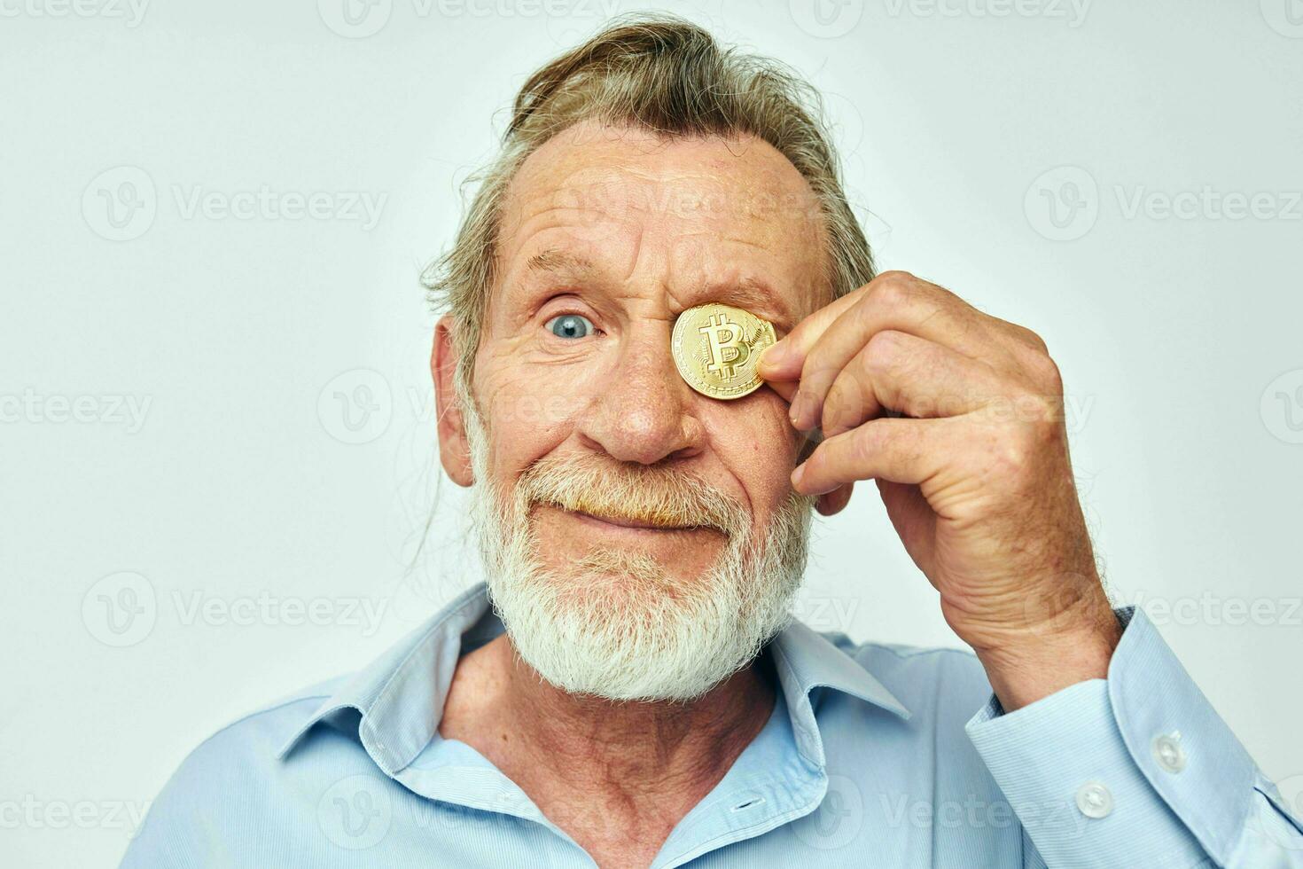 Portrait of happy senior man cryptocurrency bitcoin face close up investment cropped view photo