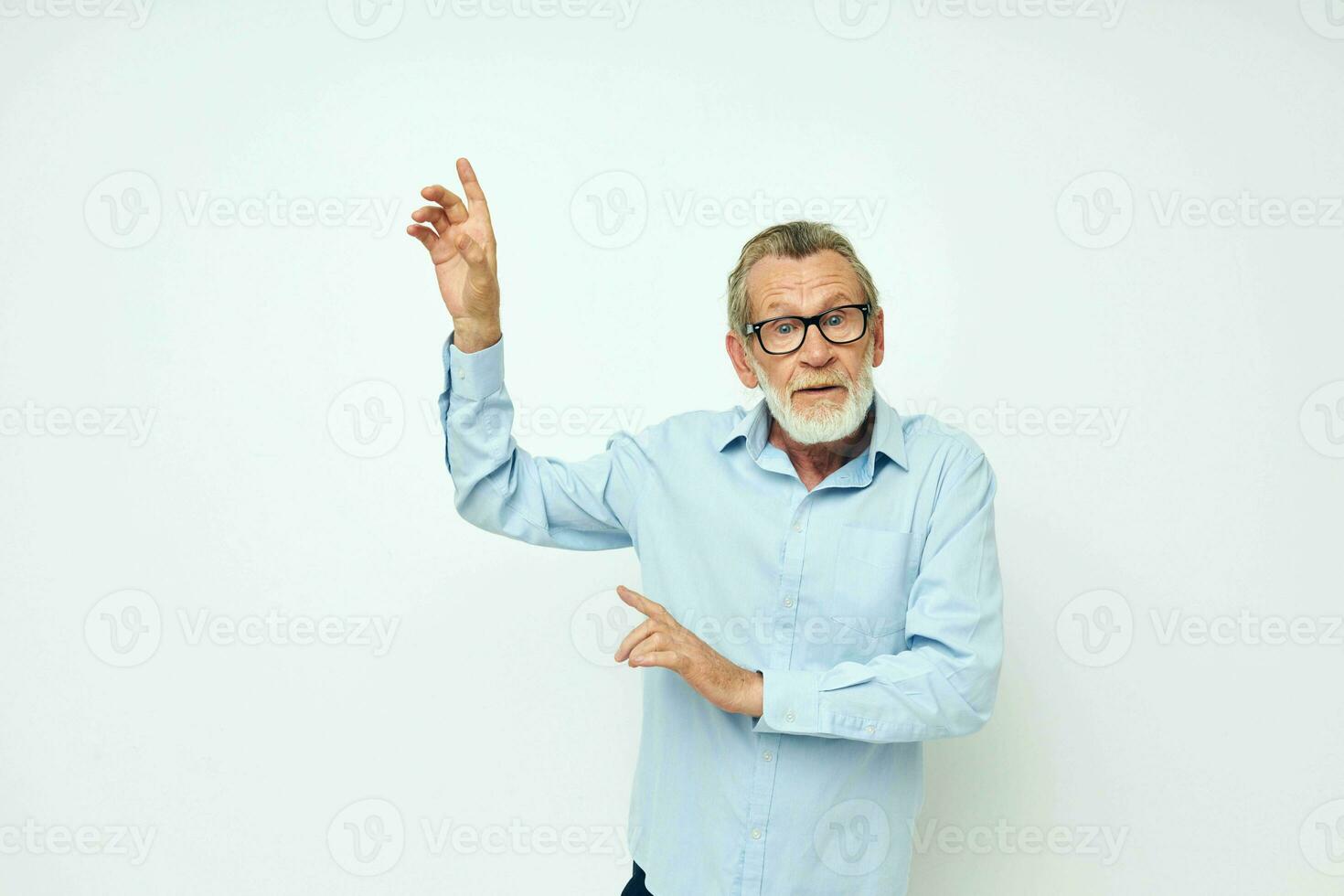 Portrait elderly man lifestyle posing hand gesture isolated background photo