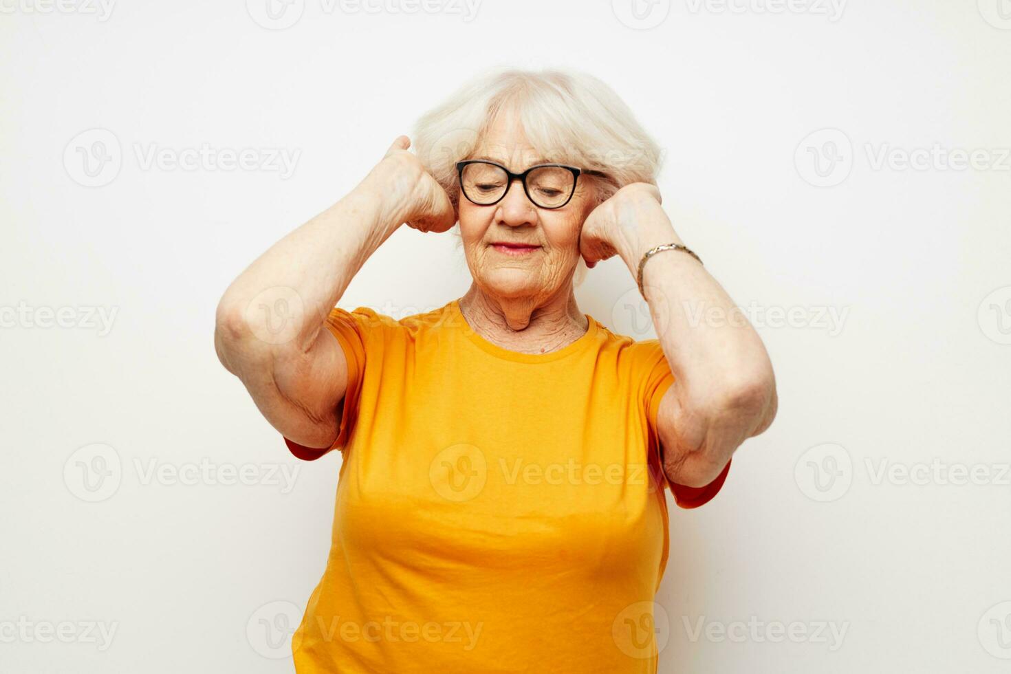 Photo of retired old lady health lifestyle eyeglasses treatment light background