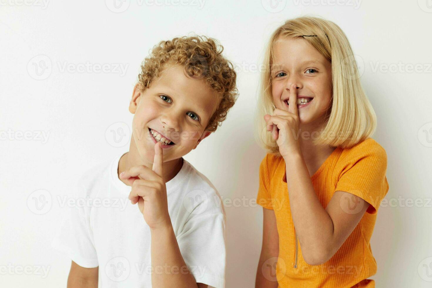 Boy and girl hand gestures fun childhood isolated background unaltered photo
