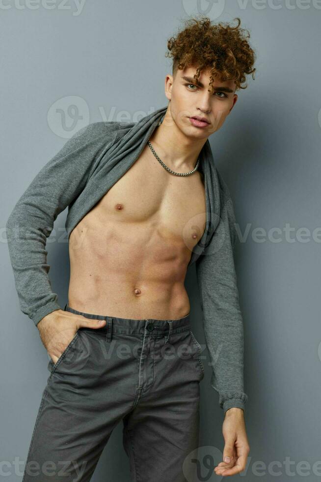 kinky guy posing inflated torso model isolated background photo