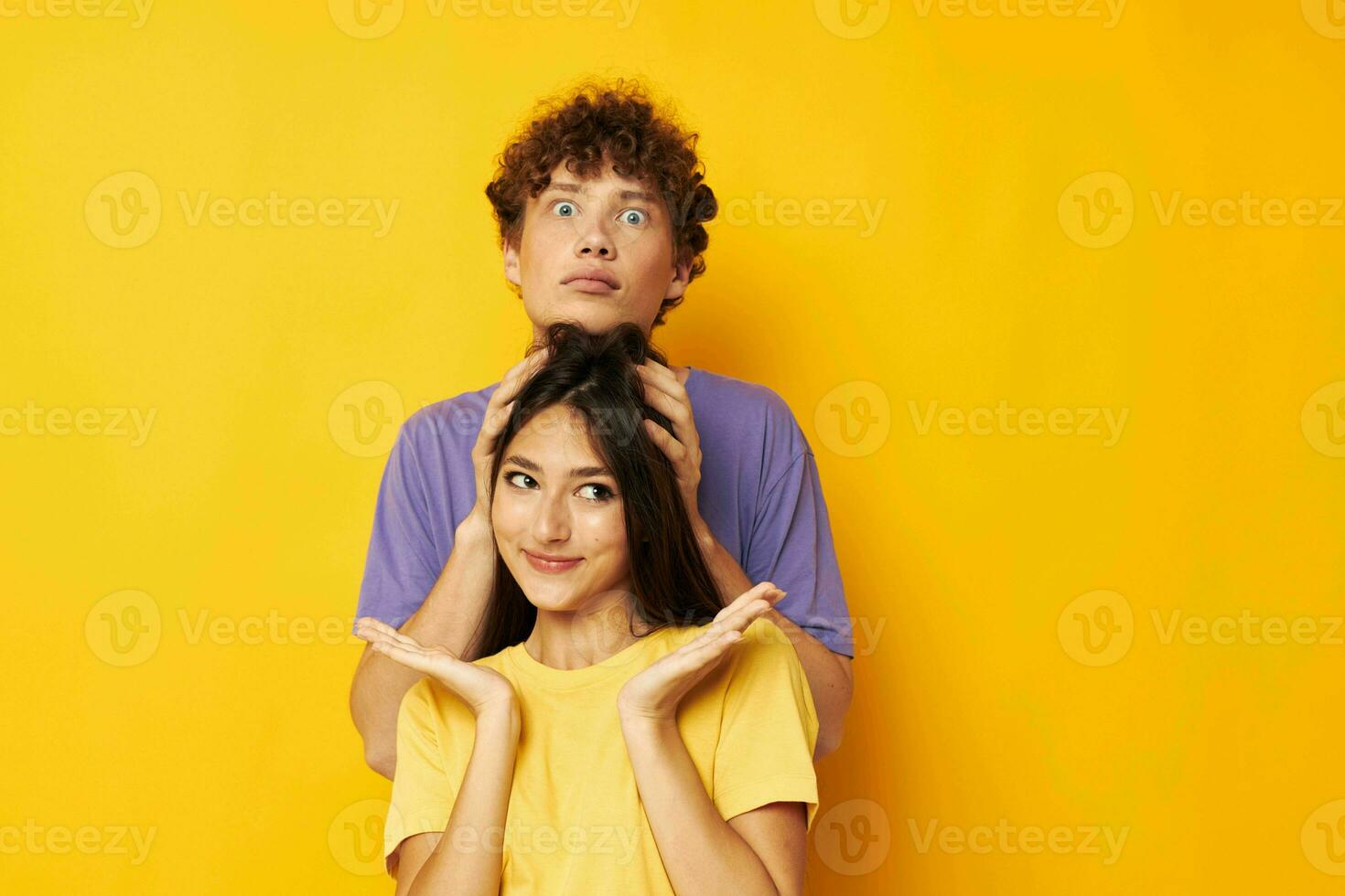 cute young couple in colorful t-shirts posing friendship fun Lifestyle unaltered photo