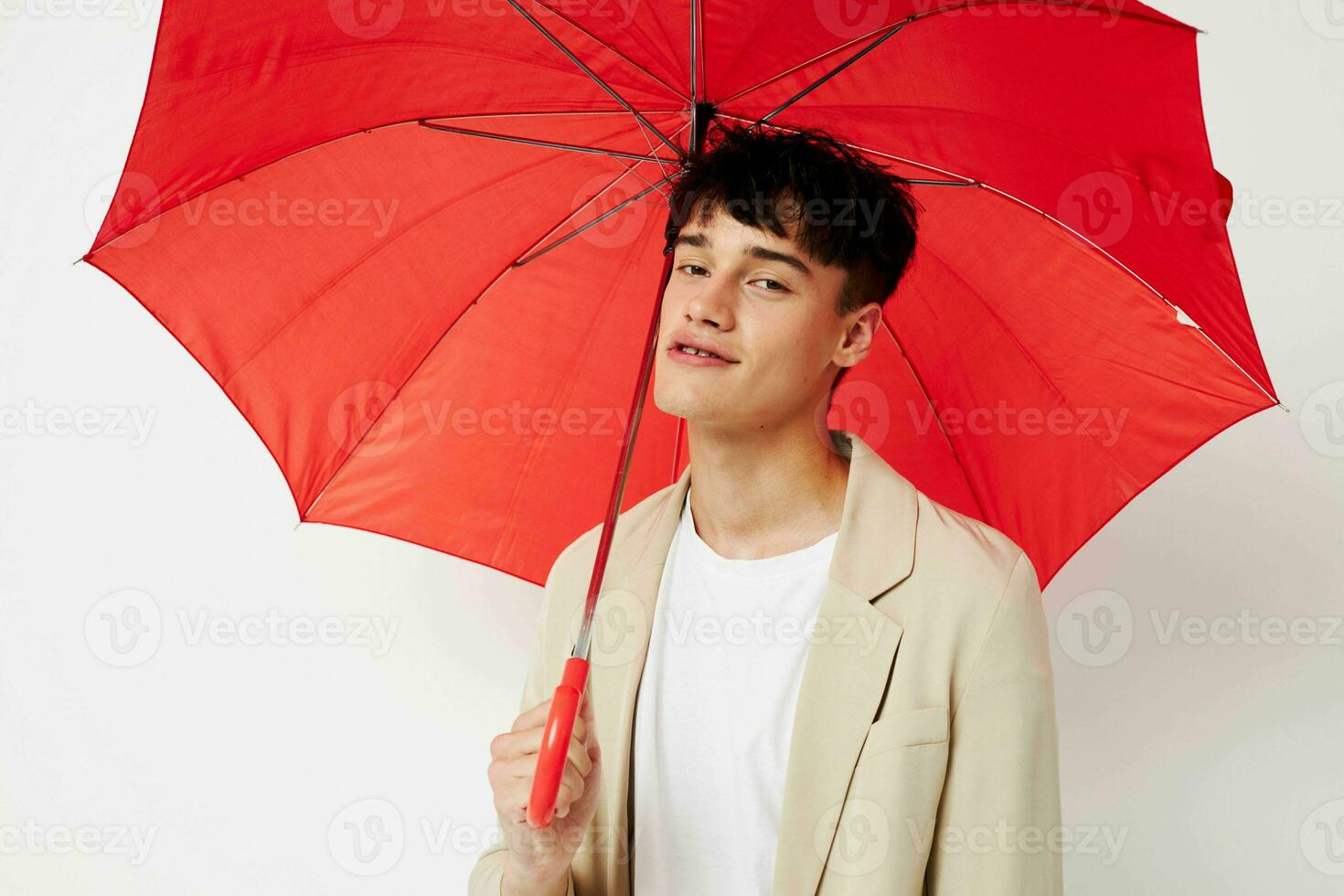 handsome guy rain protection in hand in hand modern style isolated background unaltered photo
