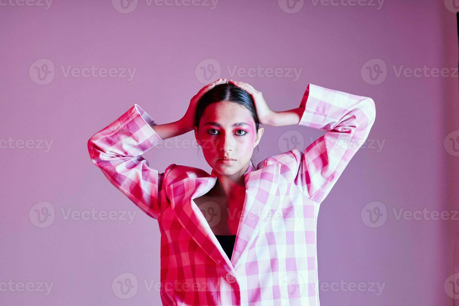 Young beautiful woman style clothing fashion posing modern style pink background unaltered photo