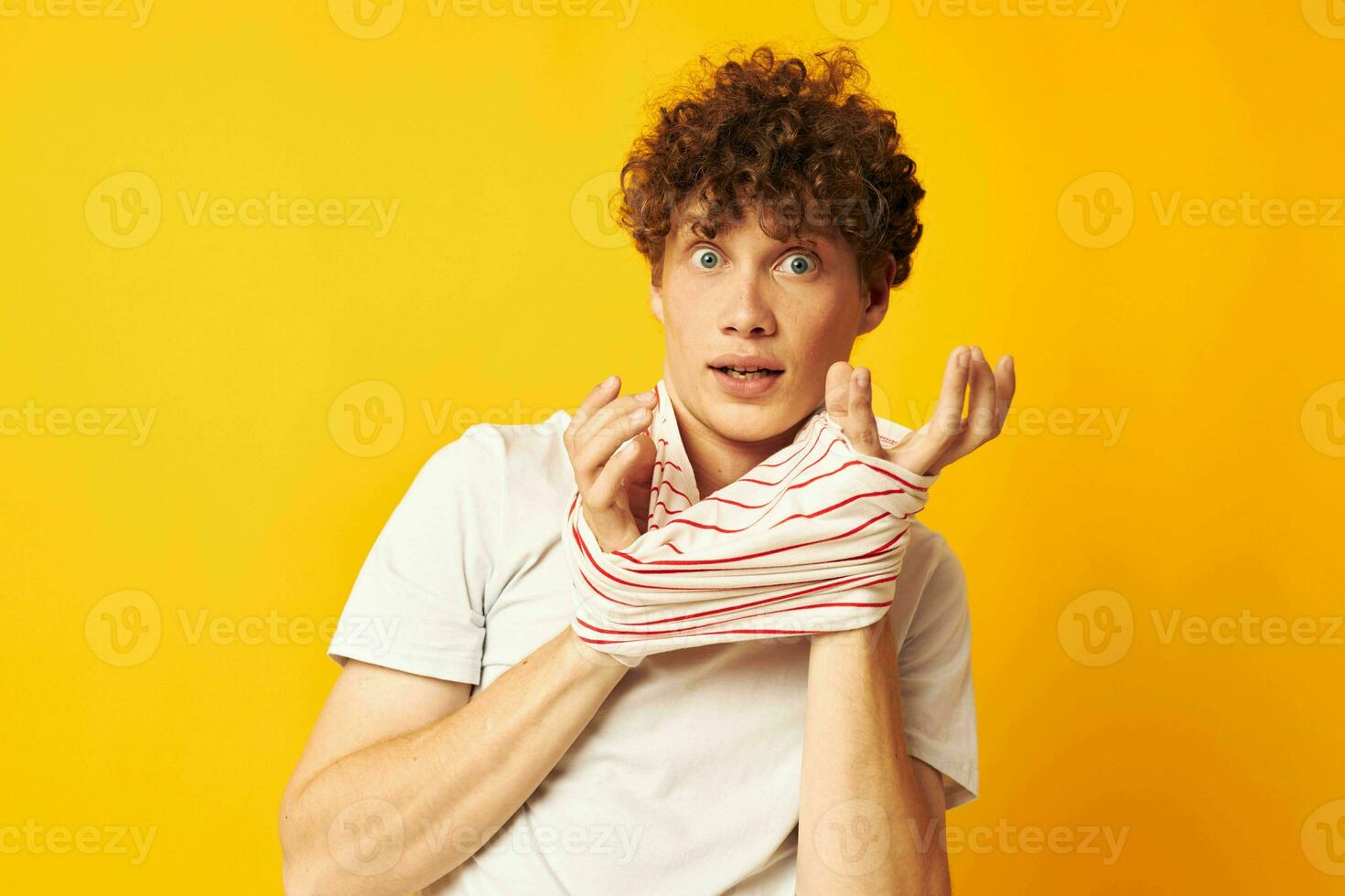 cute red-haired guy striped t shirt posing summer clothing isolated background unaltered photo