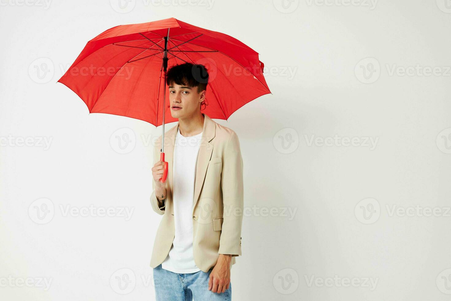 Man rain protection in hand in hand modern style light background unaltered photo