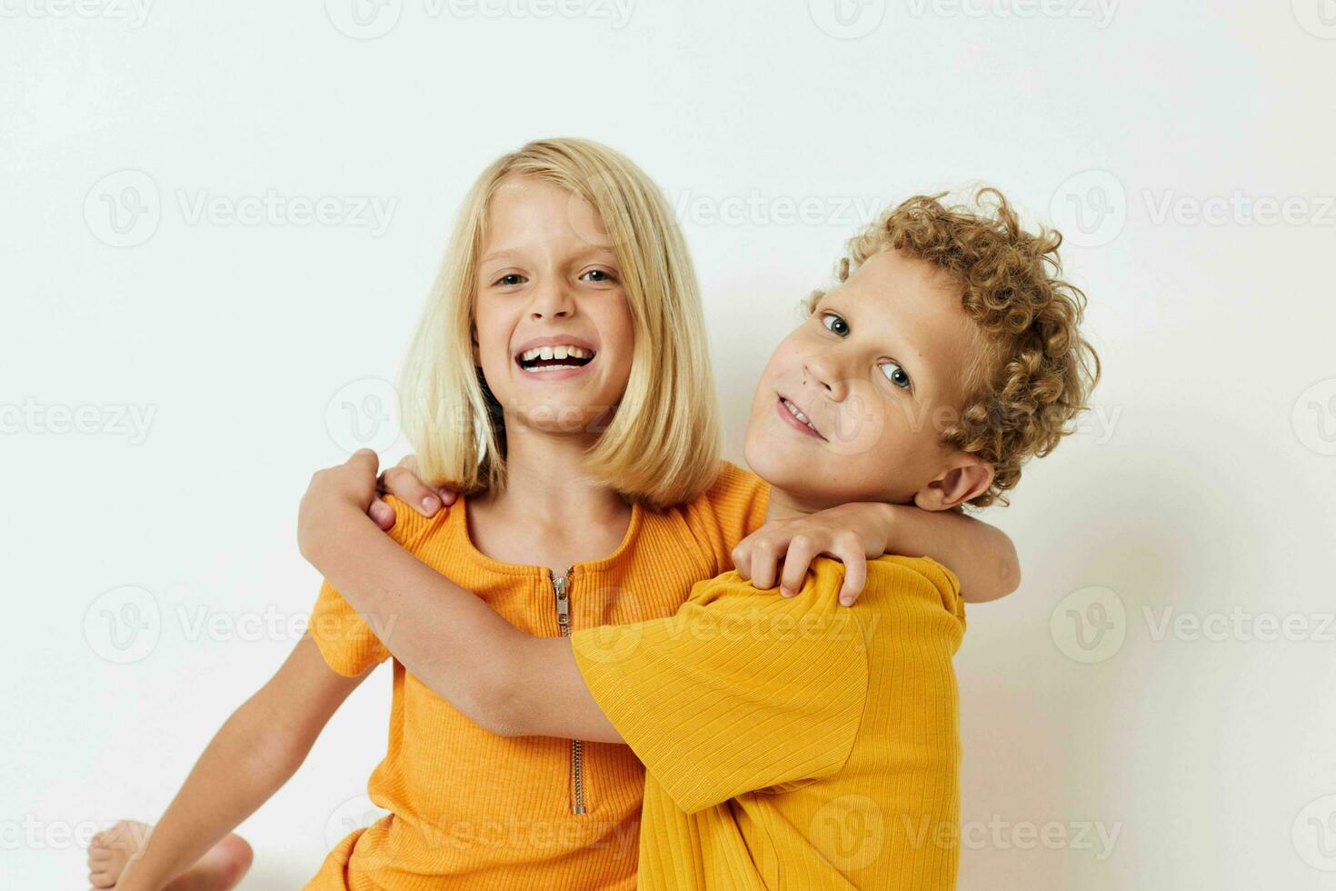 Boy and girl casual wear games fun together posing emotions quarrel isolated background unaltered photo