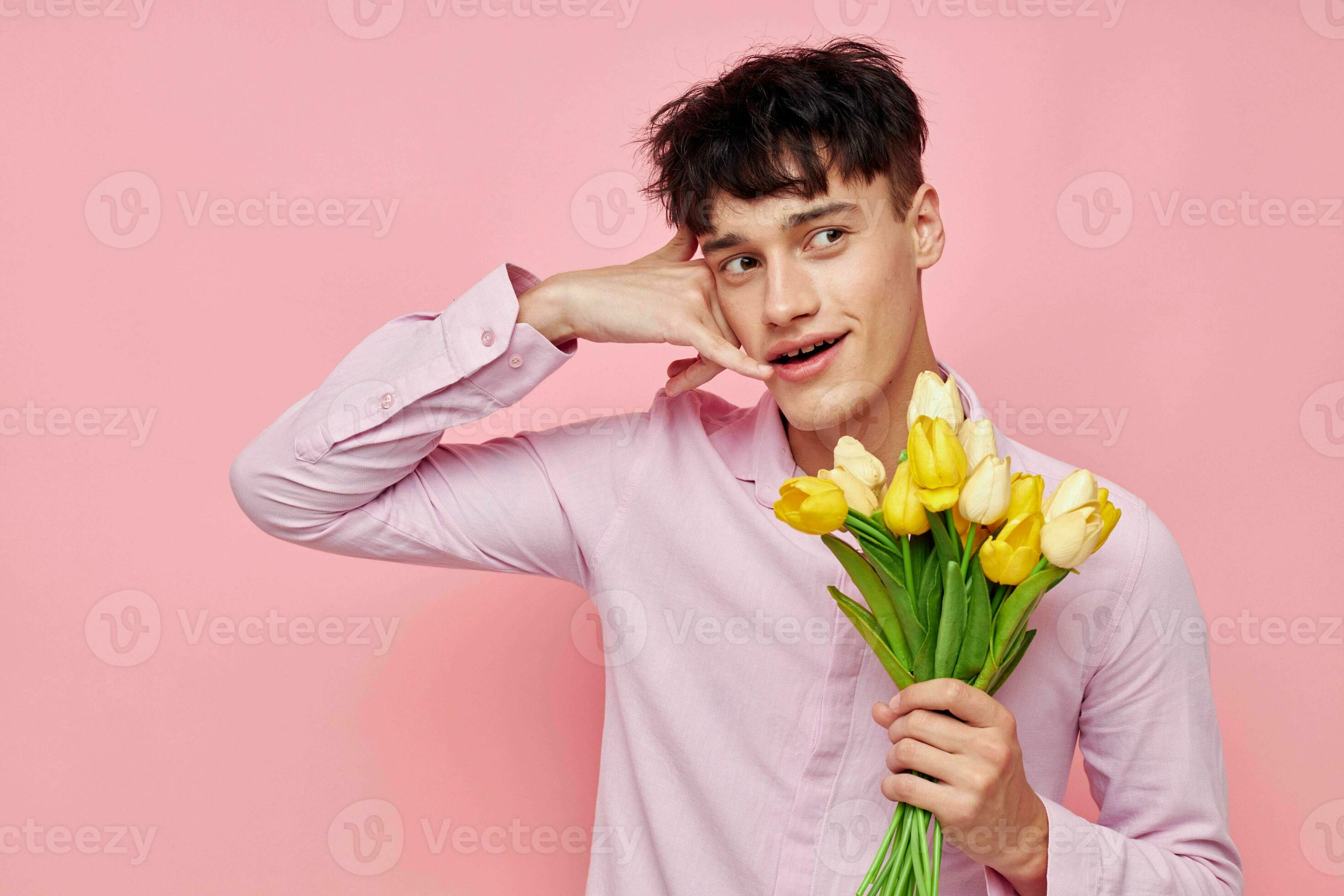 handsome guy bouquet of flowers date romance posing isolated background