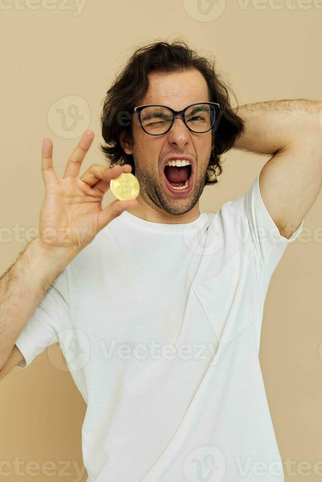 Attractive man emotions cryptocurrency finance close-up isolated background photo
