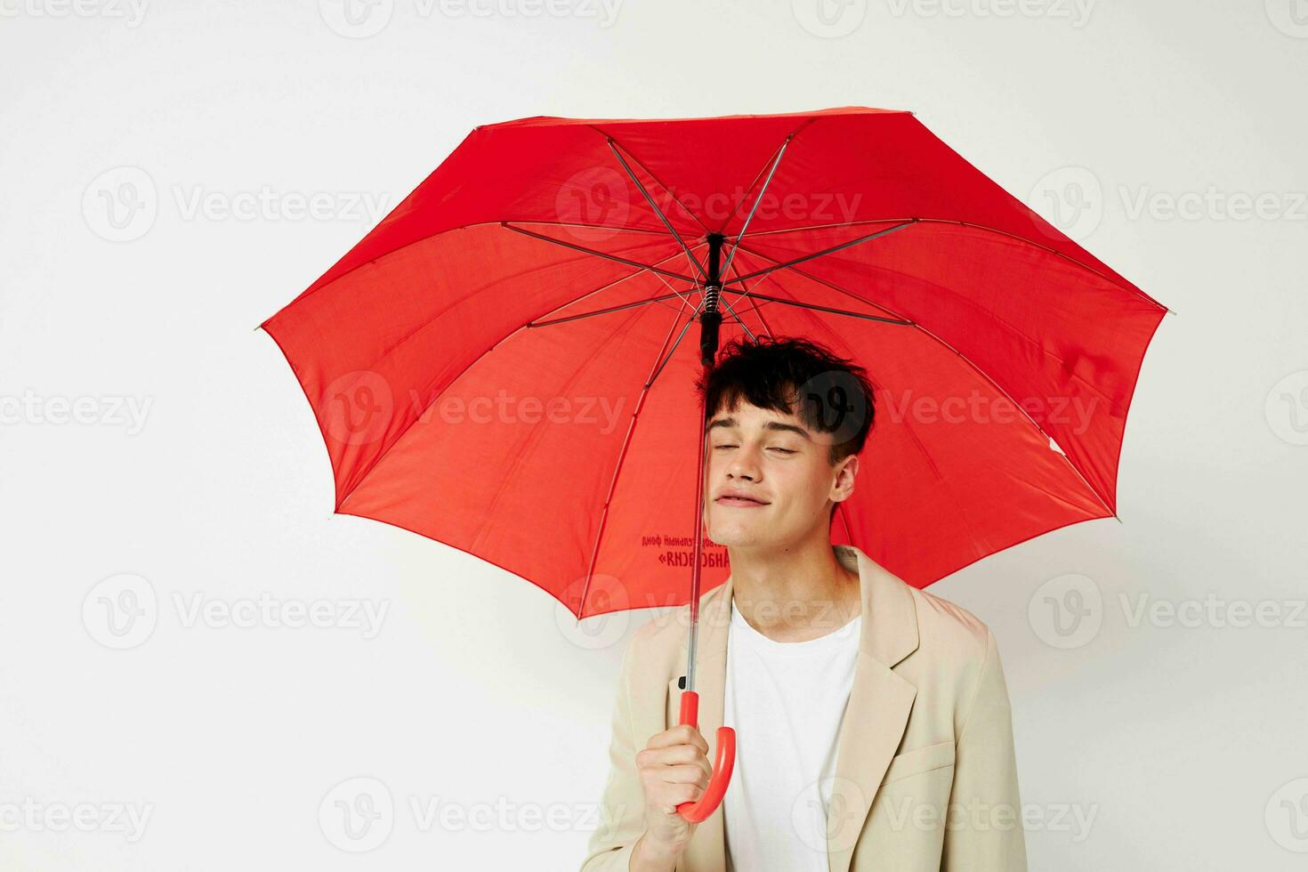 handsome guy rain protection in hand in hand modern style isolated background unaltered photo